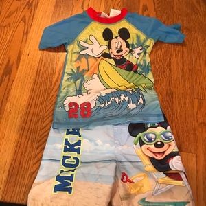 Mickey Mouse rash guard and swim trunks